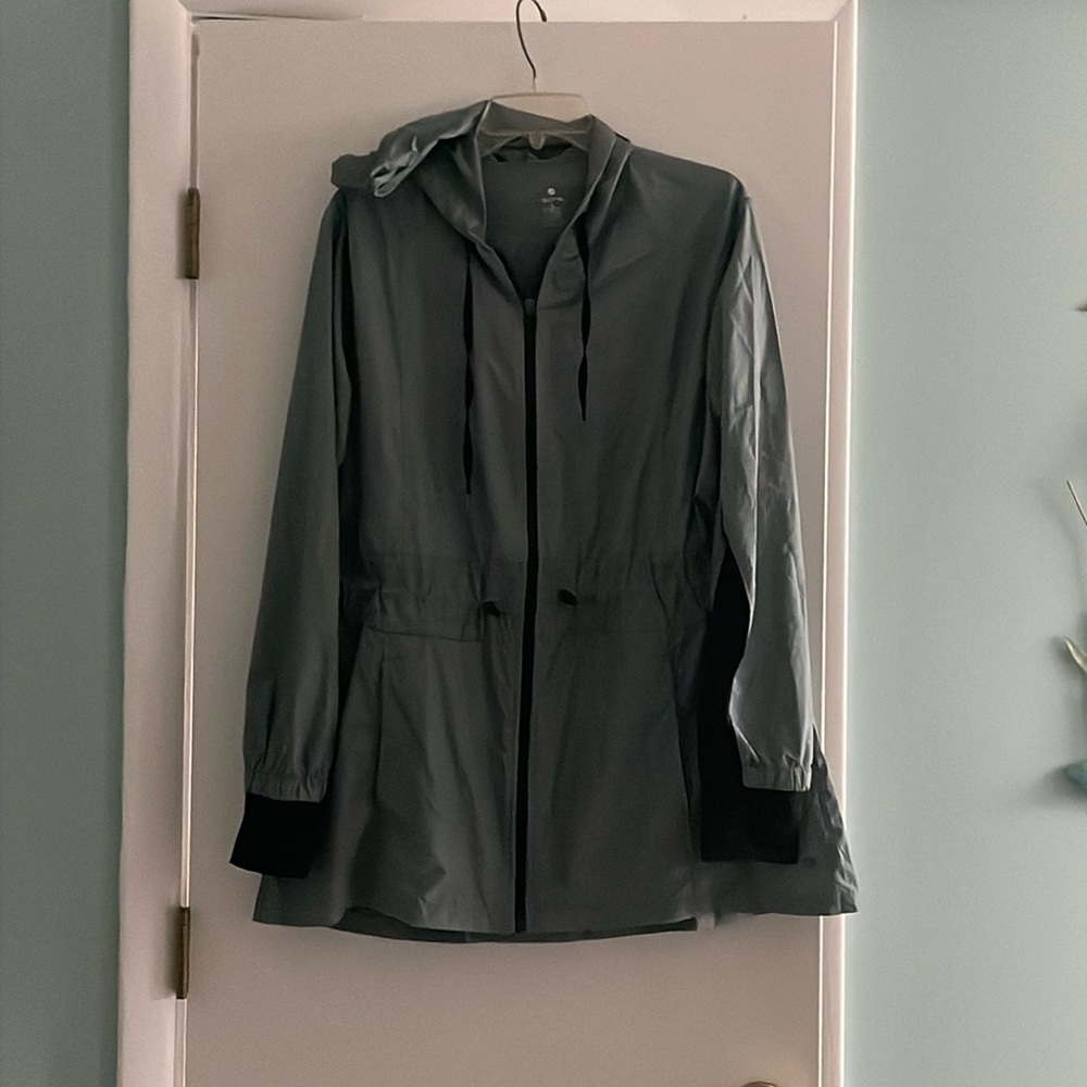 Workout or running jacket. Cinch waist, hood, and hand covers